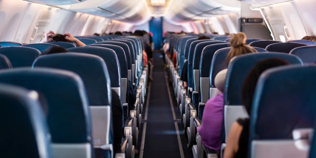 A flight attendant woke me up and told me to check my husband’s bag while he was gone – I never imagined what I would find